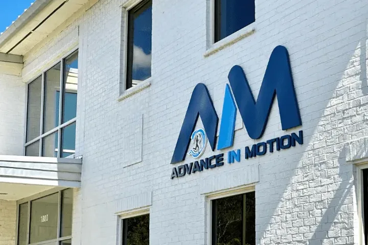 The Advance in Motion clinic entrance at 1800 Sir Tyler Drive, Wilmington