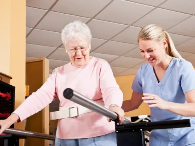 Physical therapist guiding a patient through a balance and gait exercise