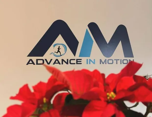The Advance in Motion logo displayed inside the clinic