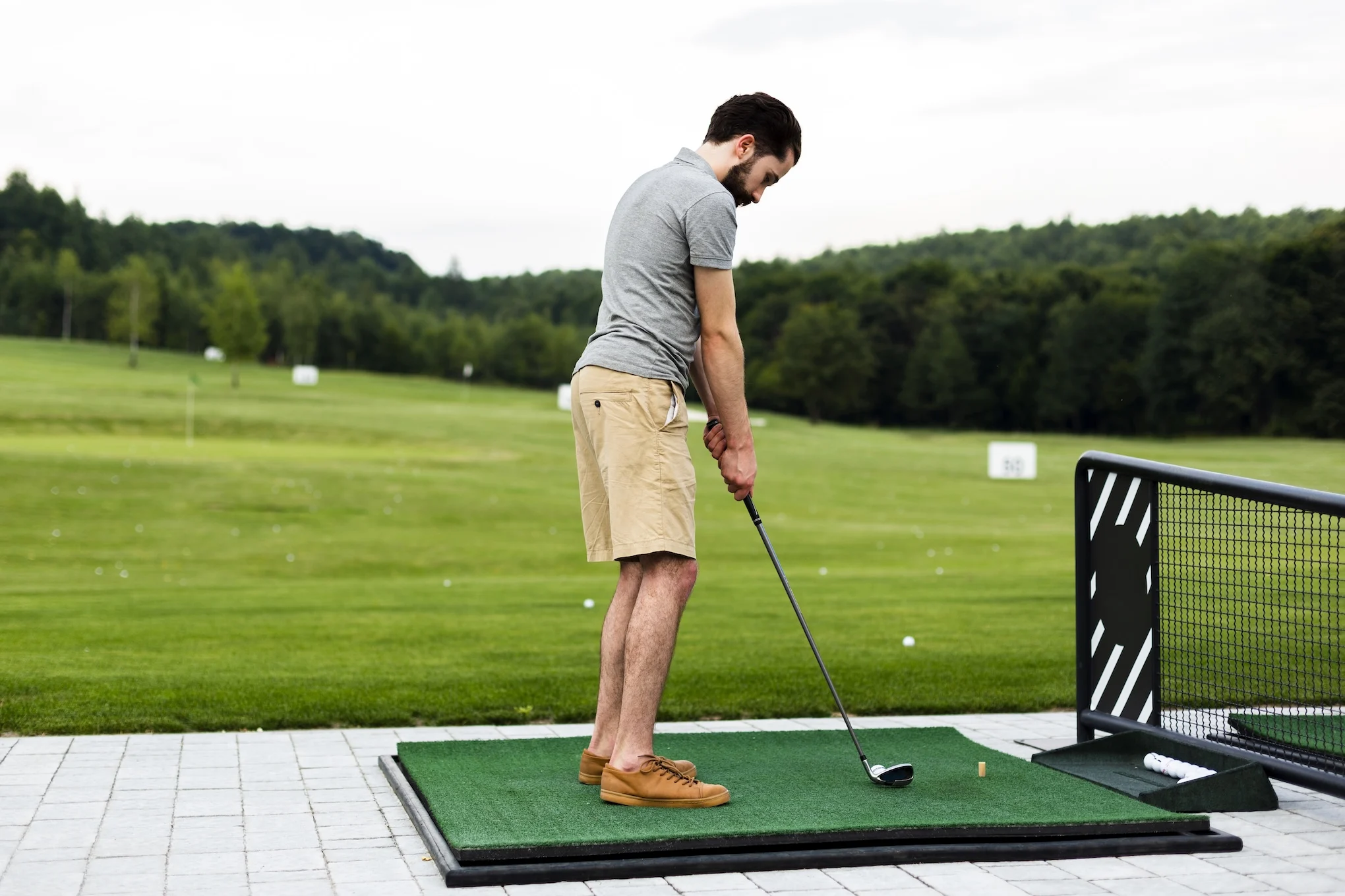 golf-player-practising-golf-field